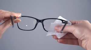 Carefully dry the lenses and frame with a clean, lint-free towel